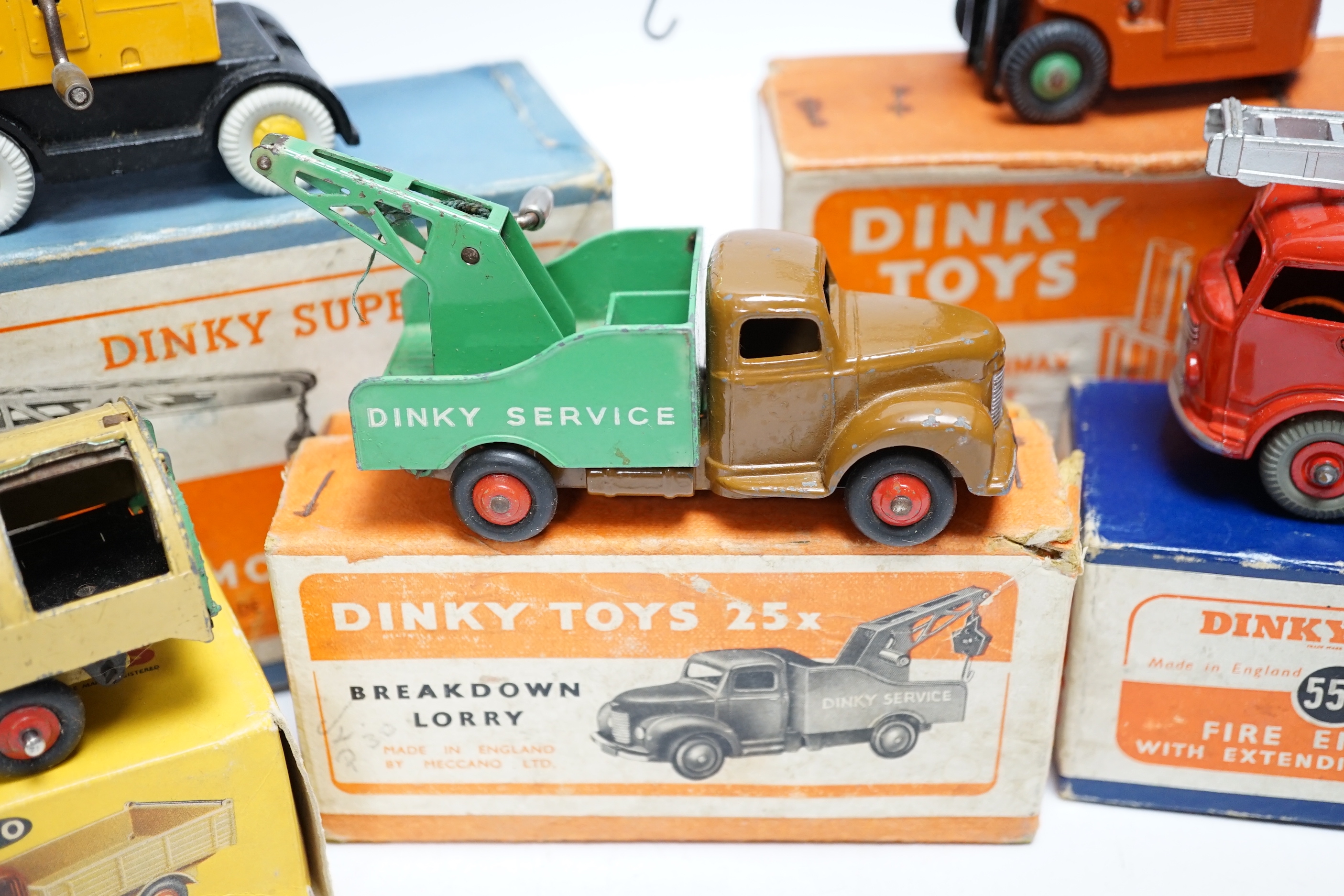 Five boxed dinky toys including (25x) breakdown lorry, (410) Bedford End Tipper, (555) Fire Engine, (571) Coles Mobile Crane, and (14c) Coventry Climax Fork Lift Truck